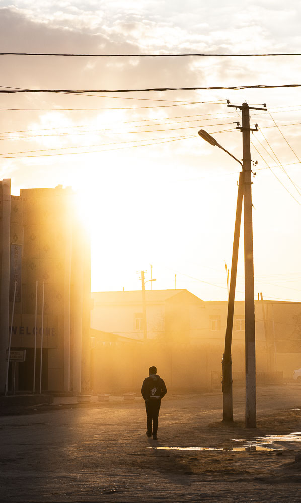 Boy walking home in Khiva